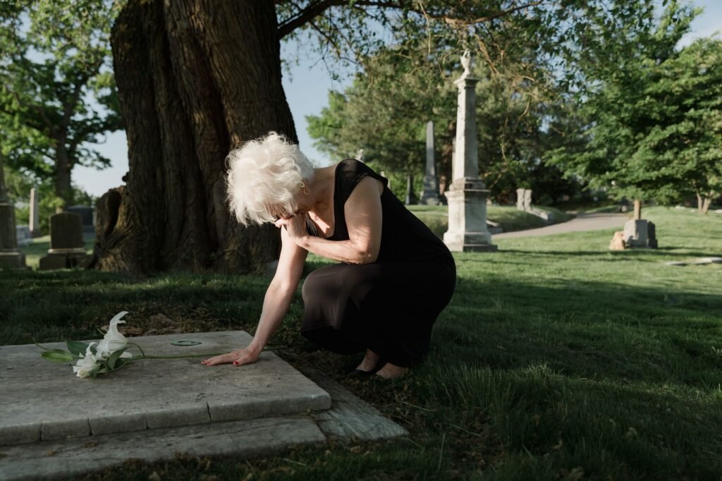 Grieving person praying Comforting Prayers for Loss