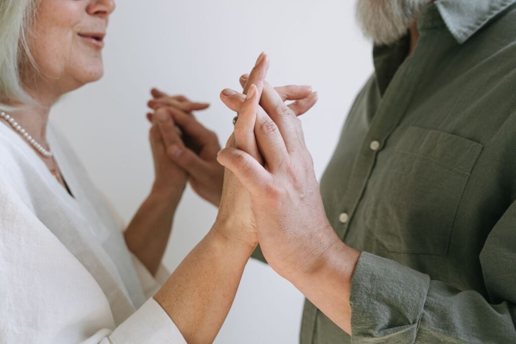 Married couple praying together Steps to Reconciliation Through Prayer