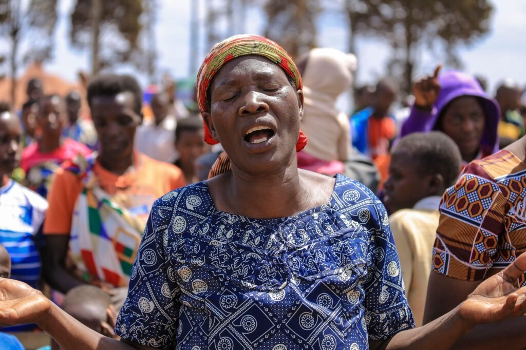 Pregnant woman praying The Role of Faith and Community