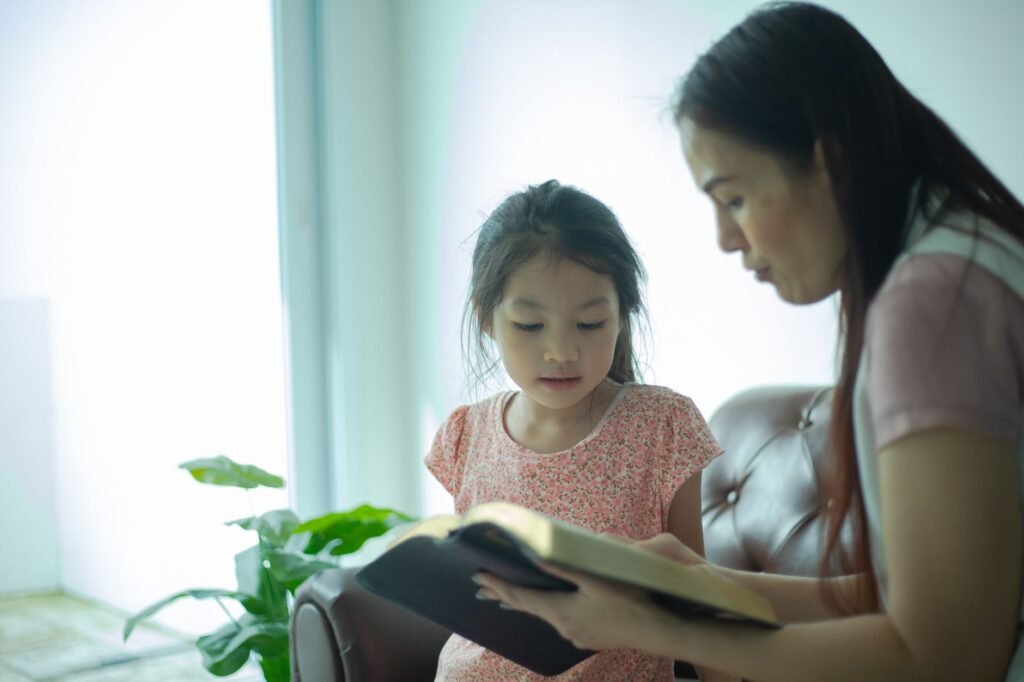Young girl reading Bible Nurturing Spiritual Growth