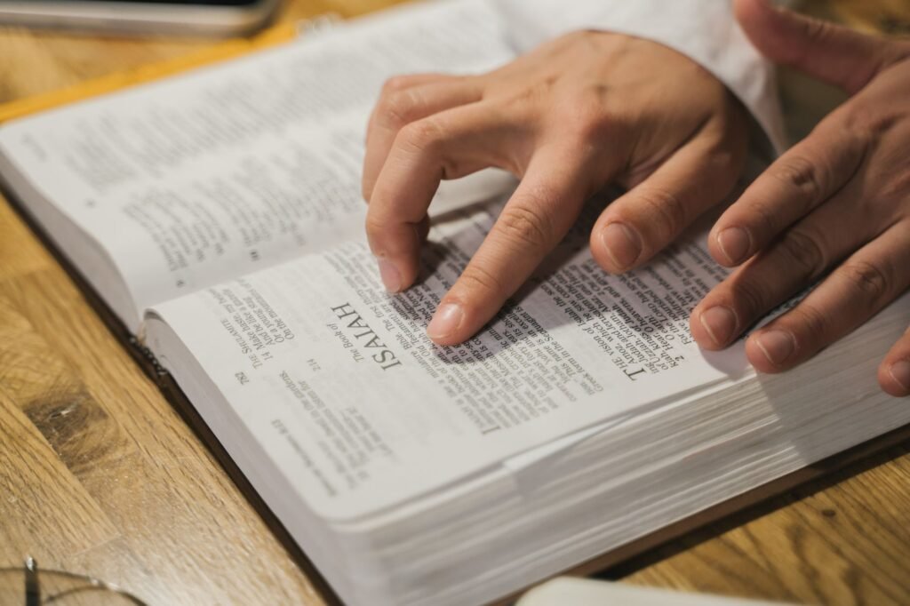 A close-up of hands in prayer, symbolizing trust in God amid fear