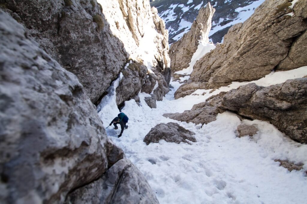 A climber overcoming challenges, symbolizing the journey of faith through trials