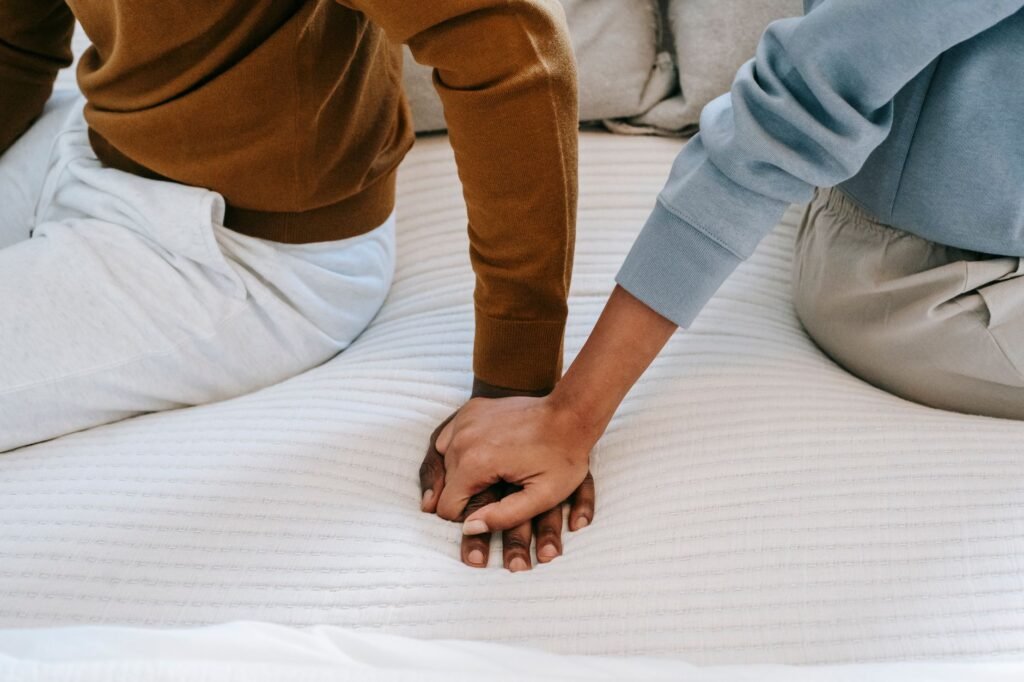 A couple praying together in a serene environment