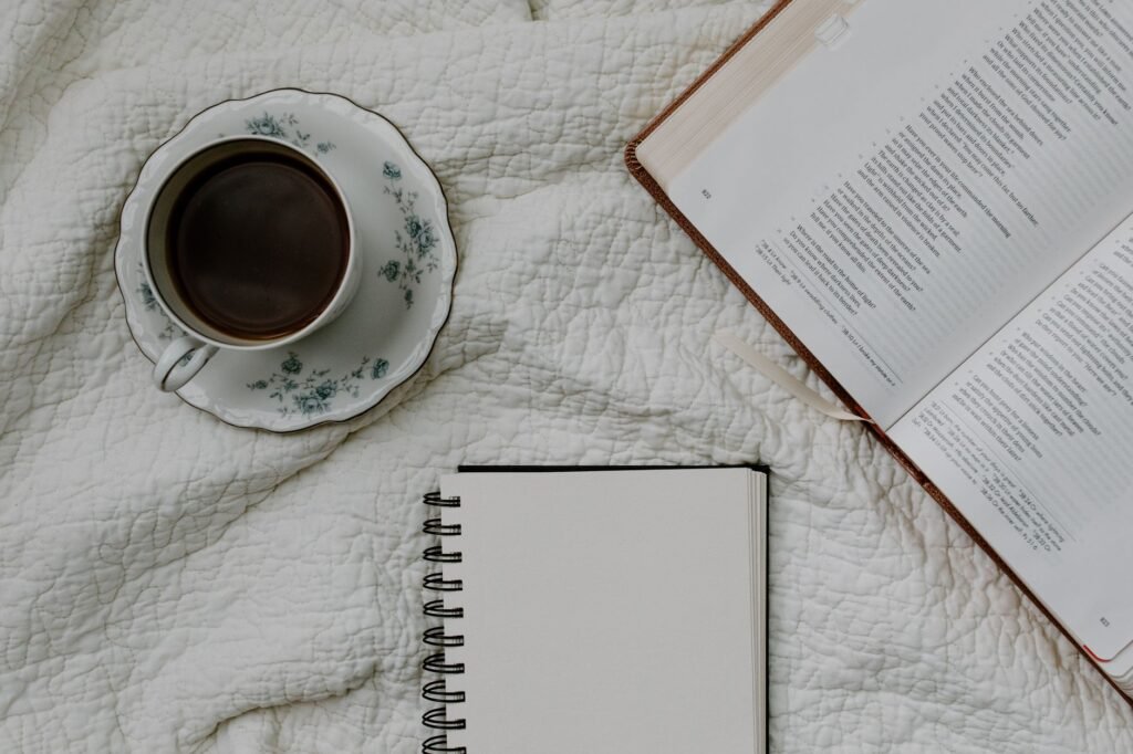 A cozy prayer corner with a Bible and a cup of coffee