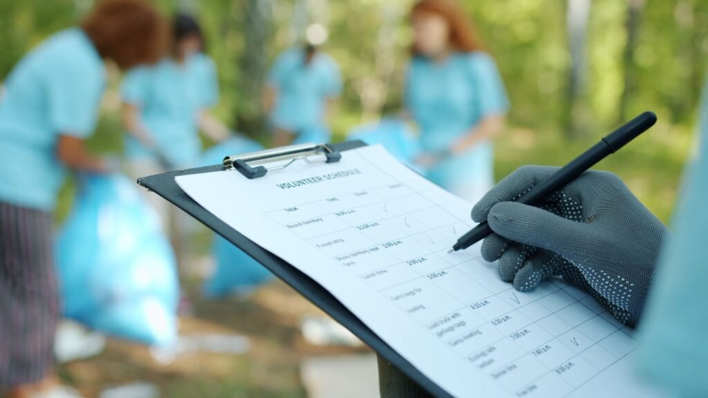 A diverse group of volunteers working together on a community project