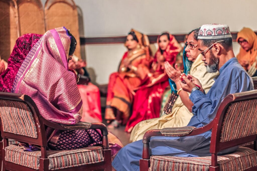 A family gathered in prayer, symbolizing love and support in relationships