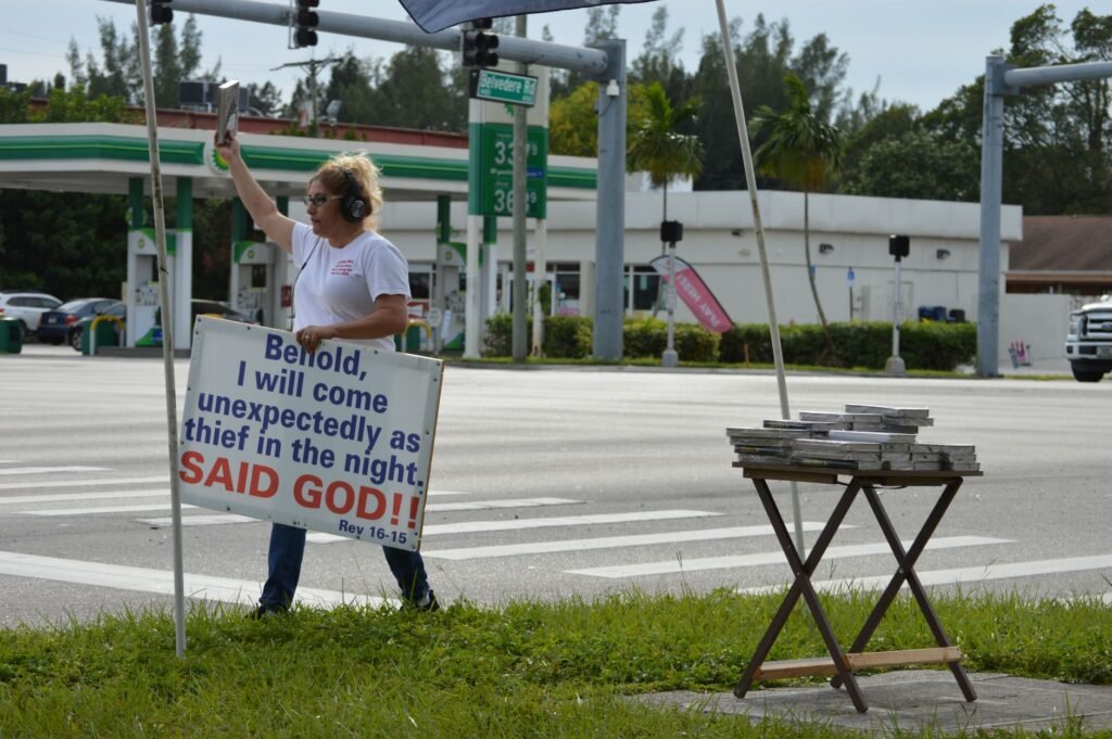 A group of people helping one another, demonstrating biblical servanthood