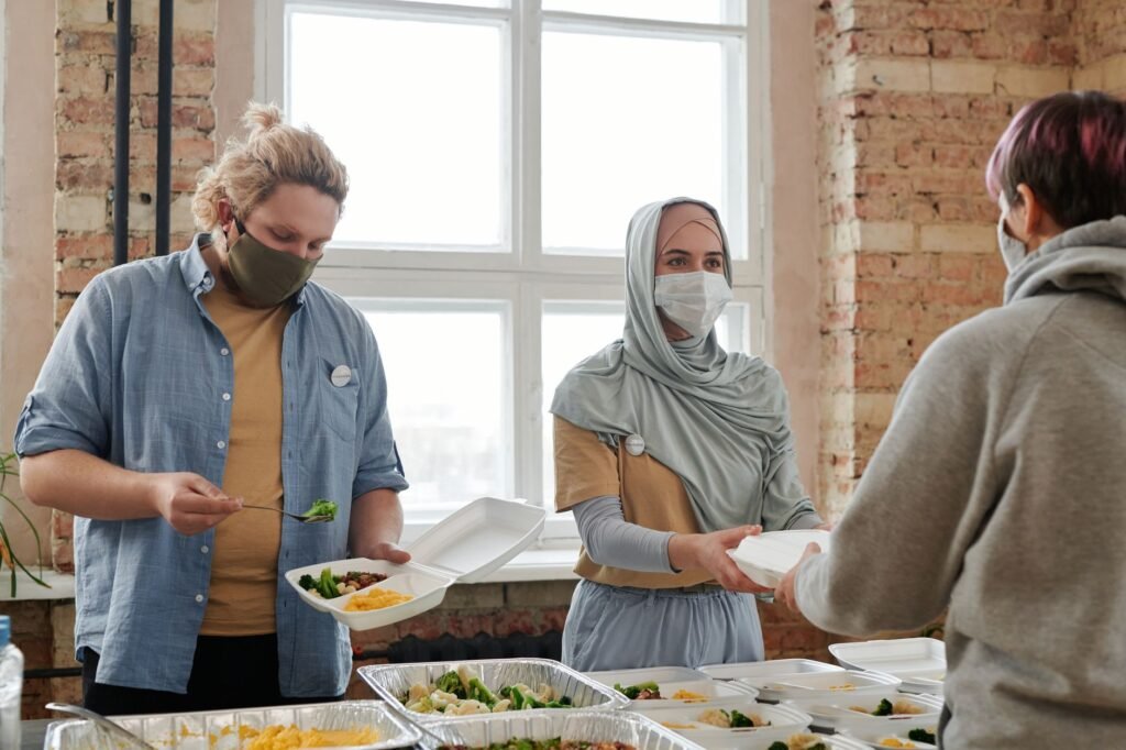 A group of people volunteering together in their community