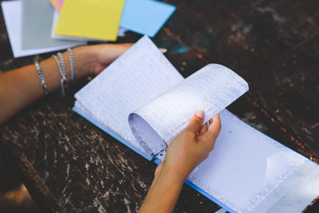 A moment of writing and reflection in a journal