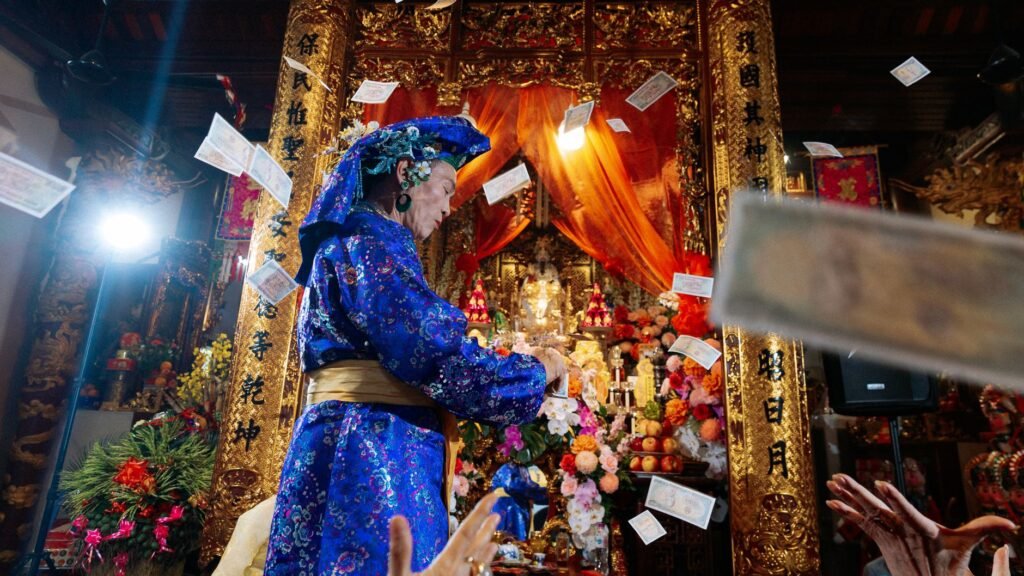 A person praying over their finances, seeking guidance