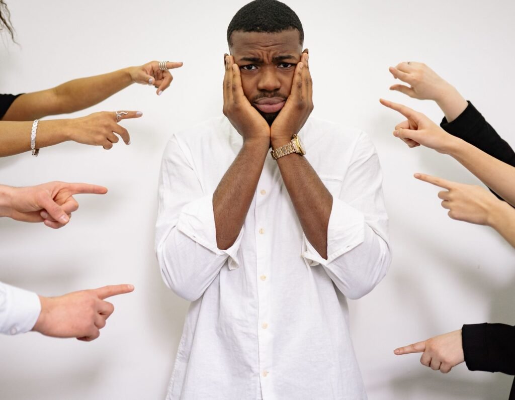 A person praying, symbolizing the act of seeking forgiveness and grace