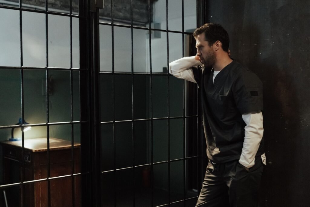An artistic representation of Joseph in prison, showcasing his resilience in adversity