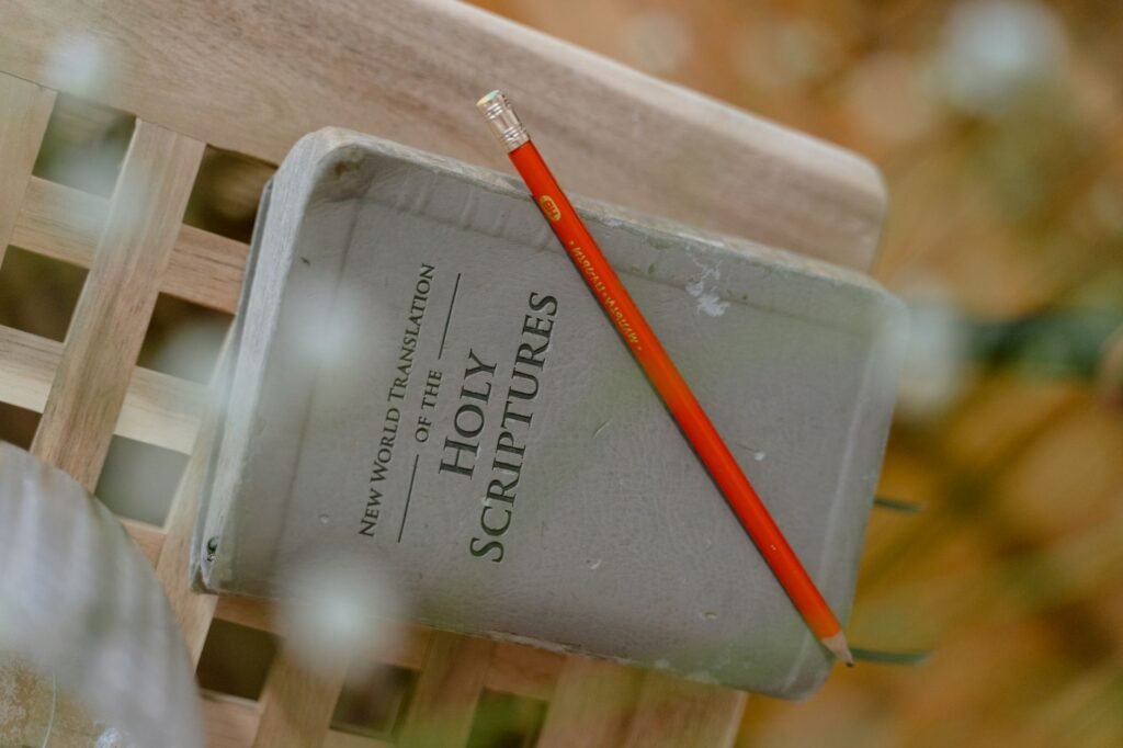 An open Bible on a table with a warm cup of coffee, inviting reflection on God’s word