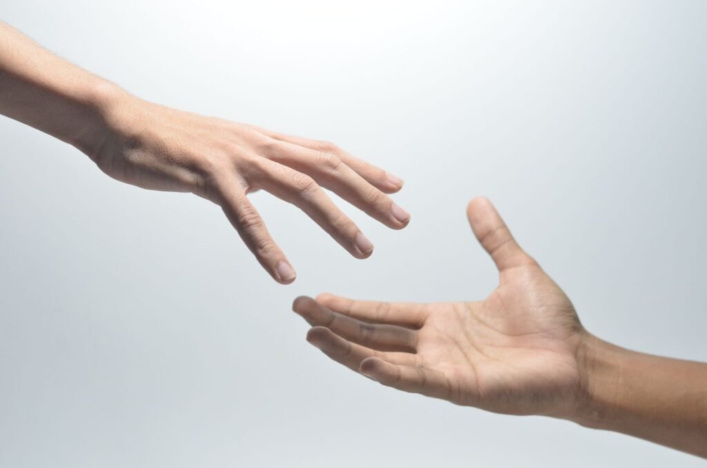 Hands working together, symbolizing service and community support