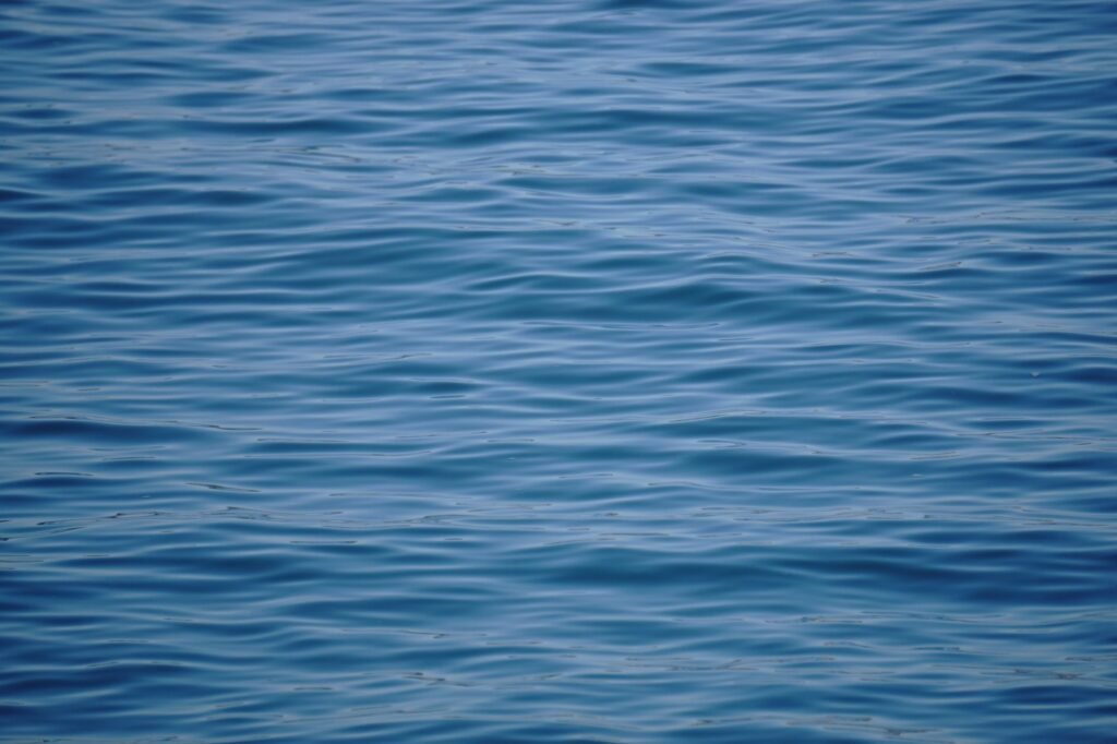 The gentle waves of an ocean, symbolizing peace and tranquility